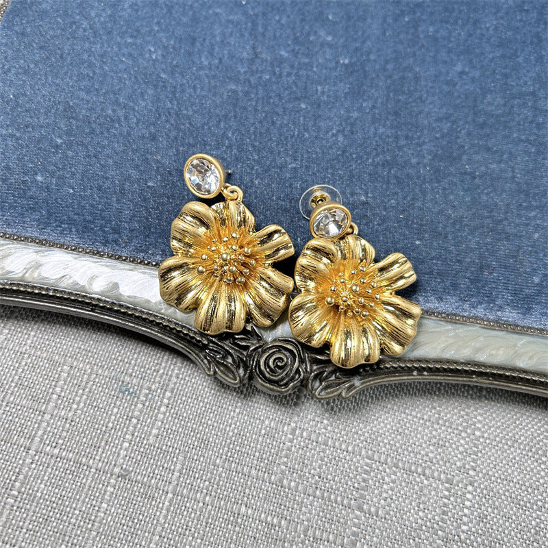 Vintage enamel cherry blossom earrings with gold-tone flower faces and clear crystal centers