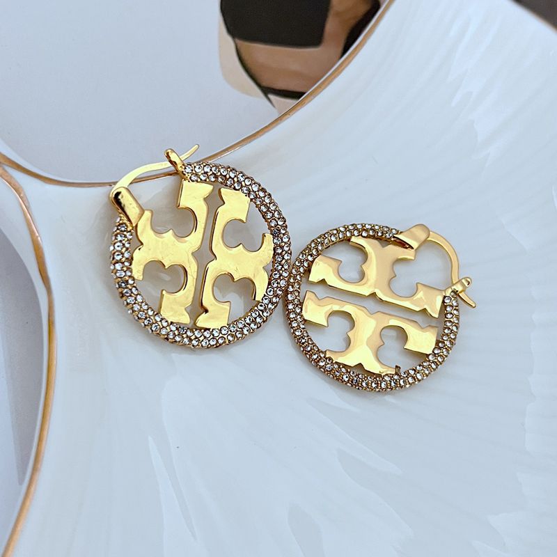Tory Burch rhinestone openwork metal hoop earrings, gold-tone, large circular cutout design