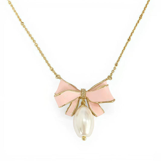 Gold bow pendant necklace with pink enamel ribbon and pearl drop center