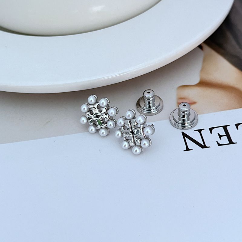 Silver-tone pearl openwork stud earrings with post backs and clustered pearls