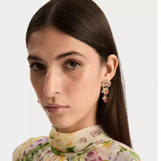 Crystal arched fan-layered stud earrings on model, gold-tone with pink stones