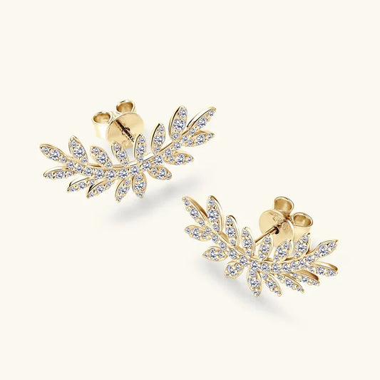 Gold leaf-shaped moissanite earrings with clustered marquise stones, pair view