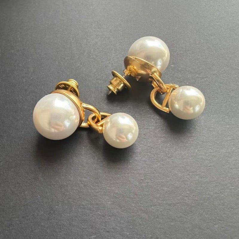 Pearl drop earrings, gold-plated brass backs with three white pearl spheres