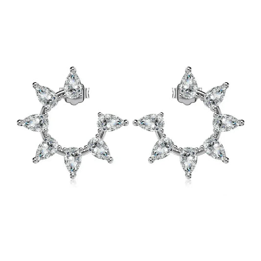 Silver-tone flower-shaped stud earrings with five marquise clear stones