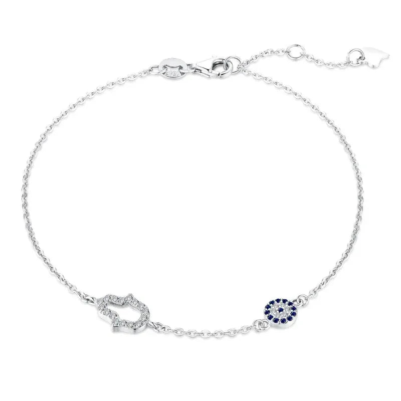 Silver-tone hamsa hand charm bracelet with blue evil-eye charm and pavé links