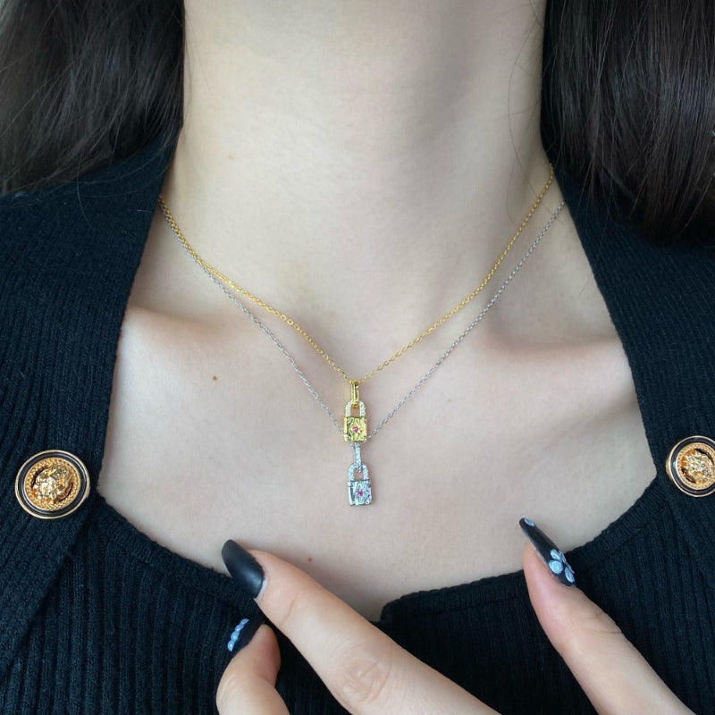 Artistic Silver Lock Shaped Necklace with Pave Diamonds and Ruby Star