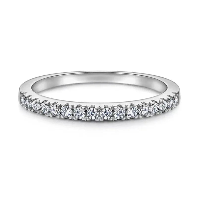 Silver band ring with pavé diamonds along the top of the shank