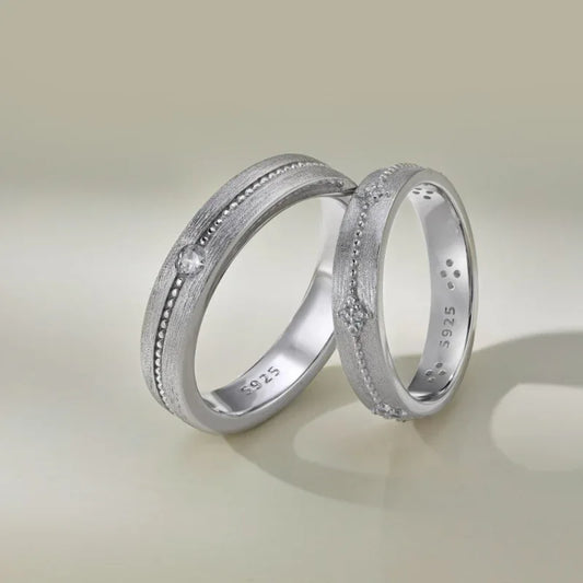 Couple engagement rings, frosted silver bands with small CZ accents, 925 stamp inside