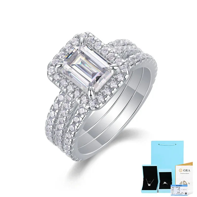 S925 silver moissanite ring with emerald-cut center stone and clustered pavé setting