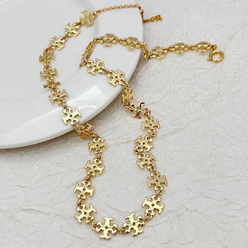 Goldfarbenes Halskettenset mit Hufeisen-Gliederkette und Karabinerverschluss