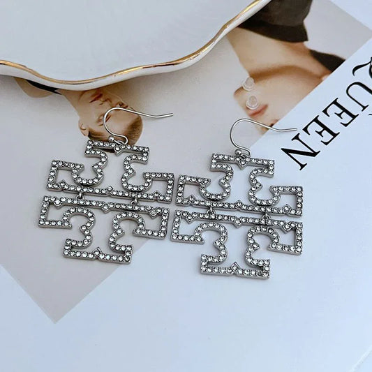 Inlay rhinestone hollow drop earrings, silver-tone geometric script design