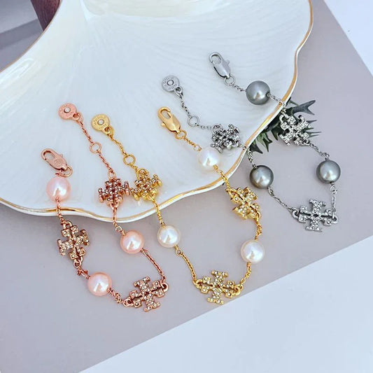 Rhinestone pearl bracelet set in gold, rose gold, and silver with pearl beads