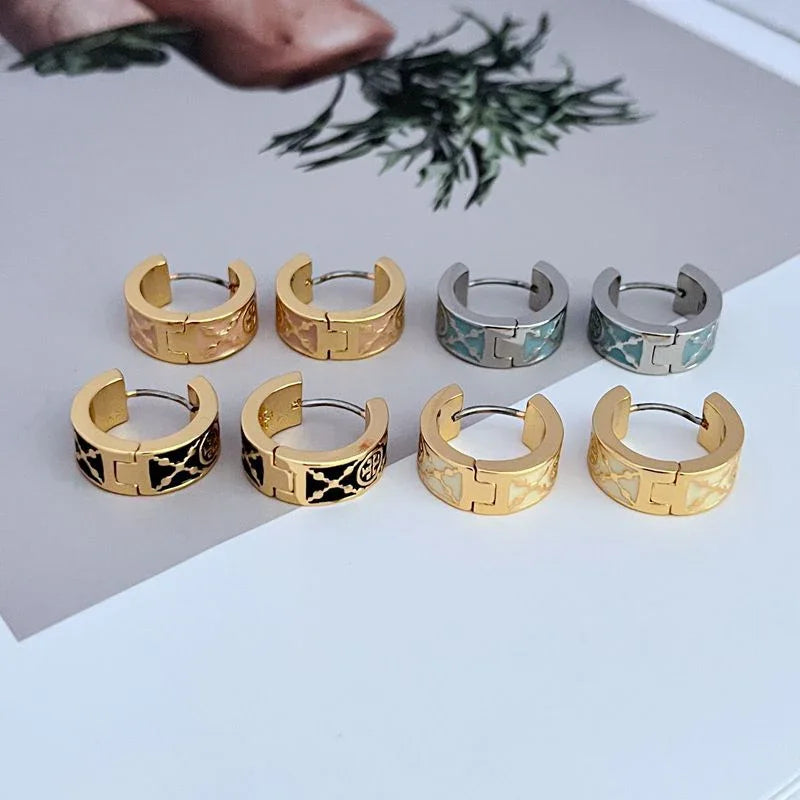 Enamel hoop earrings set: gold, black leopard, and blue enamel tones