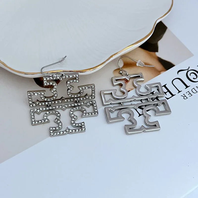 Silver-tone inlay rhinestone hollow drop earrings with geometric script motif