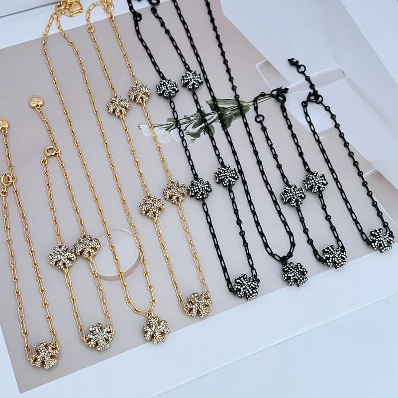 Tory Burch Gold and Gray Bracelet New Tory Burch Gold Lucky Clover Charm Chain Bracelets Pick  main image 3