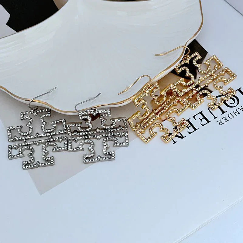 Inlay rhinestone hollow drop earrings, gold-tone geometric script design