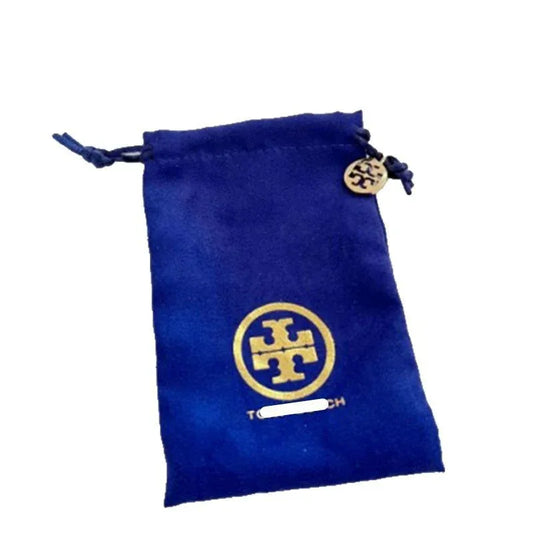 Blue drawstring pouch bag with circular Tory Burch logo plate and lettering
