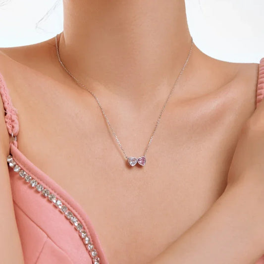 Silver-tone double heart CZ pendant necklace with clear and pink heart charms
