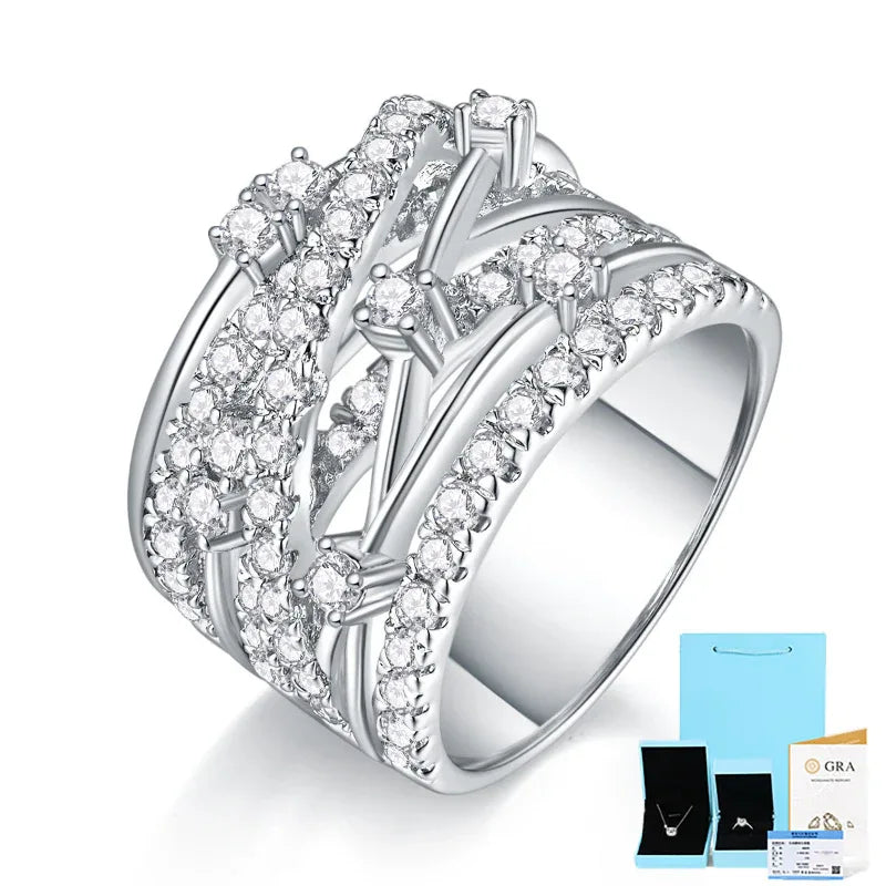 Halo moissanite ring with prong-set stones and bright silver-tone finish