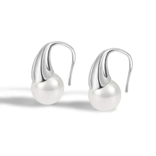 Silver shell pearl hook earrings with round white pearl on curved hook