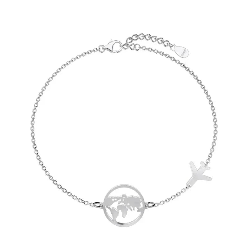 Silver charm bracelet with world map round pendant and airplane charm