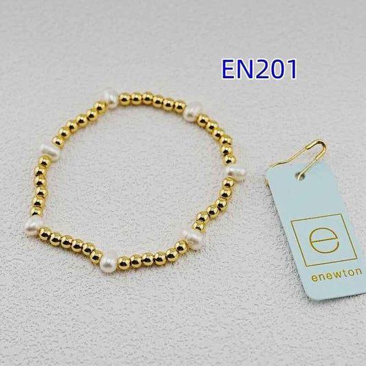 Enewton pearl bead bracelet featuring gold-toned beads and white pearls