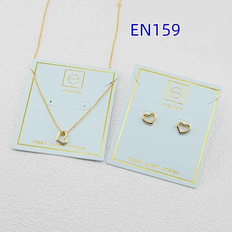 enewton heart-shaped earrings and necklace - gold color