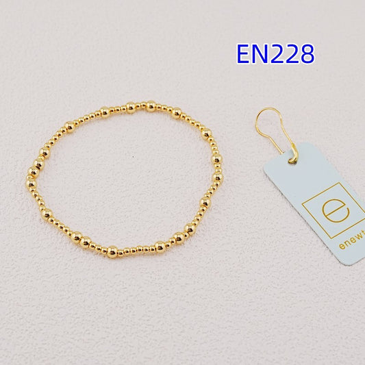Gold ball-bead metal bracelet, flexible loop with uniform bead spacing