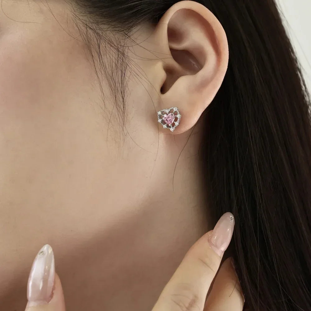 Heart-shaped S925 silver stud earring with pink center stone and glittering halo