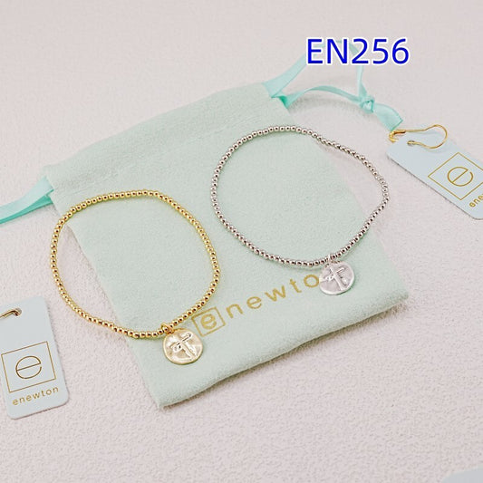 White gold bead bracelet with round disc cross pendant, hook clasp
