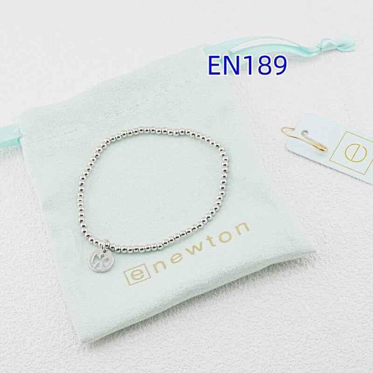 White gold beaded pendant bracelet with angel disc charm