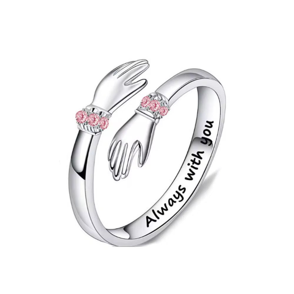 Adjustable S925 silver ring with hugging hands and pink stones, says 'Always with you'