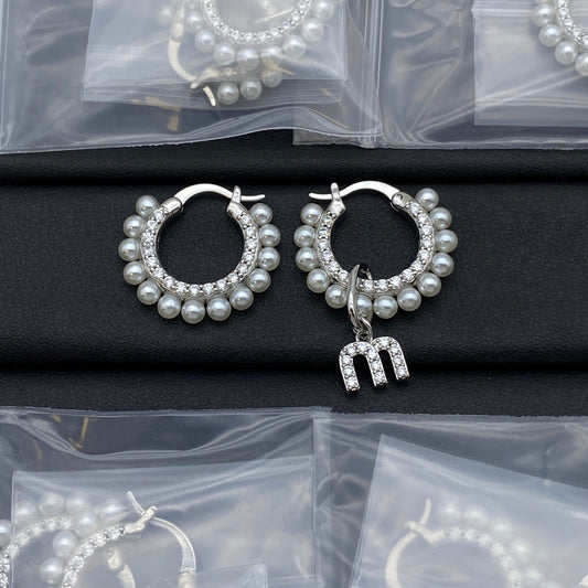 White gold pearl and crystal hoop earrings with dangling letter charm