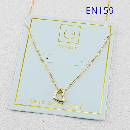 Gold heart pendant necklace with small heart charm on chain