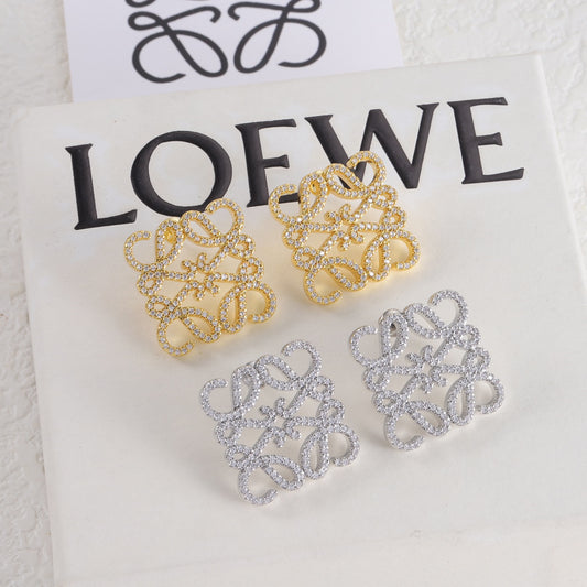 Gold and white-gold hollow square logo stud earrings with pavé stones
