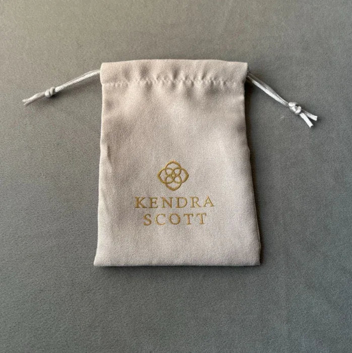 Kendra Scott fabric drawstring bag, beige with gold logo