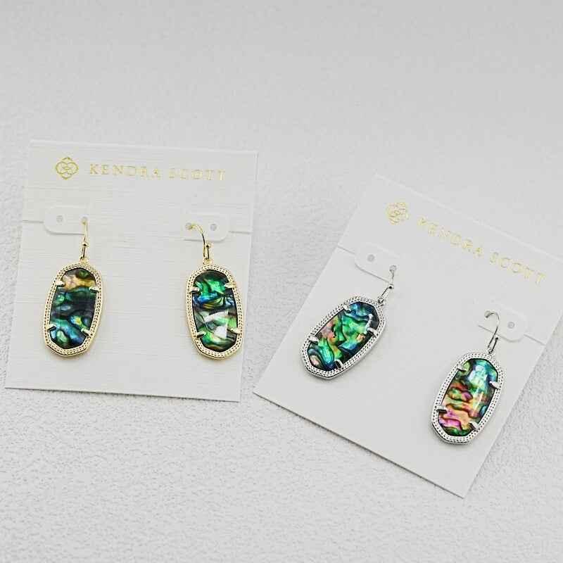 Oval abalone shell dangle earrings, iridescent ovals with gold-tone and silver-tone frames