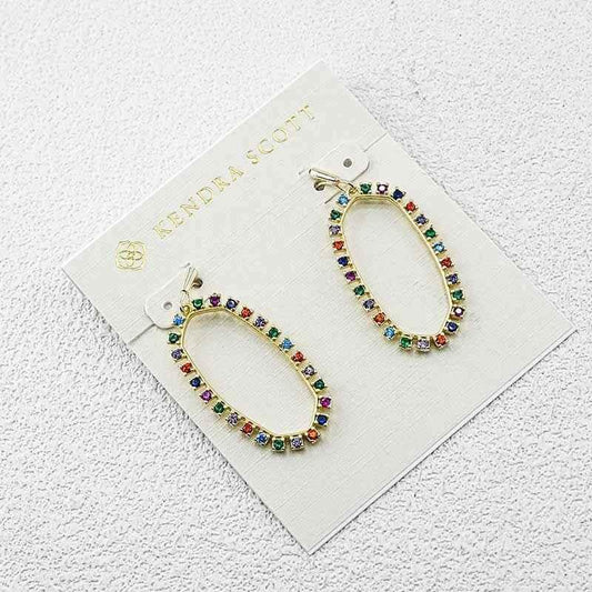 Gold-tone oval hoop earrings with multicolor zirconia row and stud backs