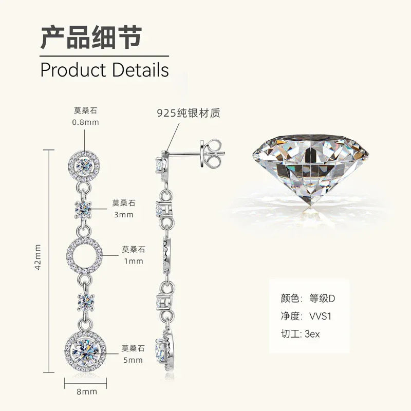 Linked drop earrings profile with round halo stones and circular links, 42mm length.