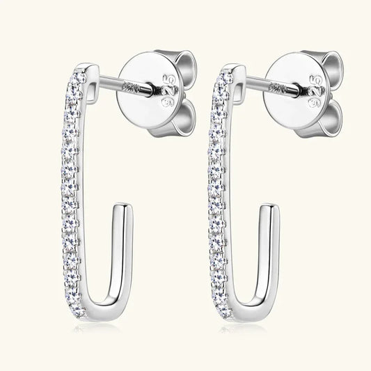 Silver-tone U-shaped pavé hoop earrings with clear round stones, post-and-back closure