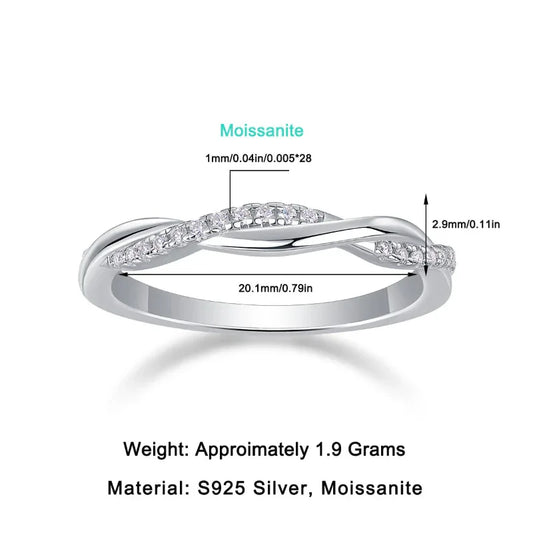 Silver moissanite engagement ring with curved bar setting and small round stones