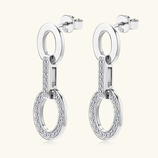 White gold double oval drop earrings with oval halo stones and vertical pavé accents