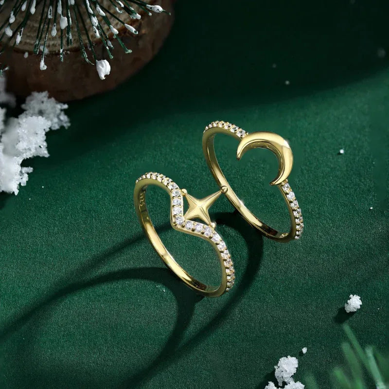 Gold-tone crescent moon and star charm rings with pavé sparkle