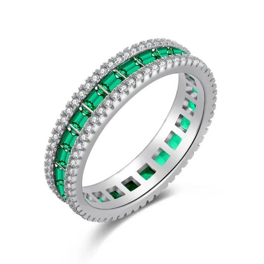 Sterling silver diamond band ring with green stones along the top edge