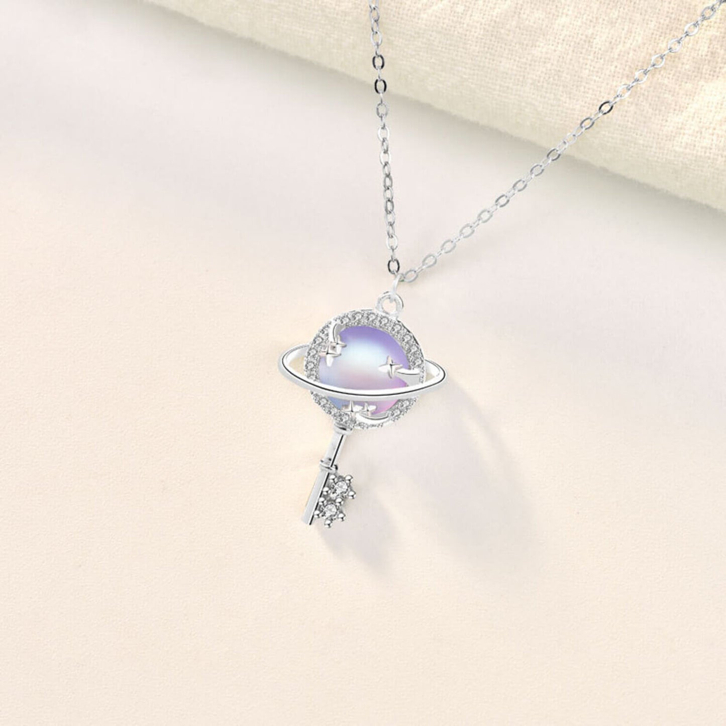 planet key necklace