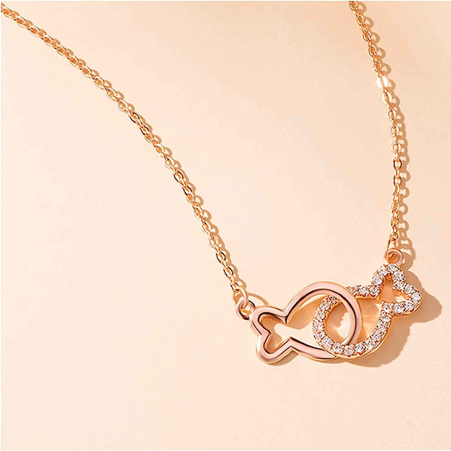 interlocking fish pendant