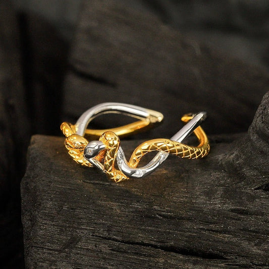 Dual-tone intertwined snake ring in 18K gold plating and rhodium finish by Jimmy Jewelry