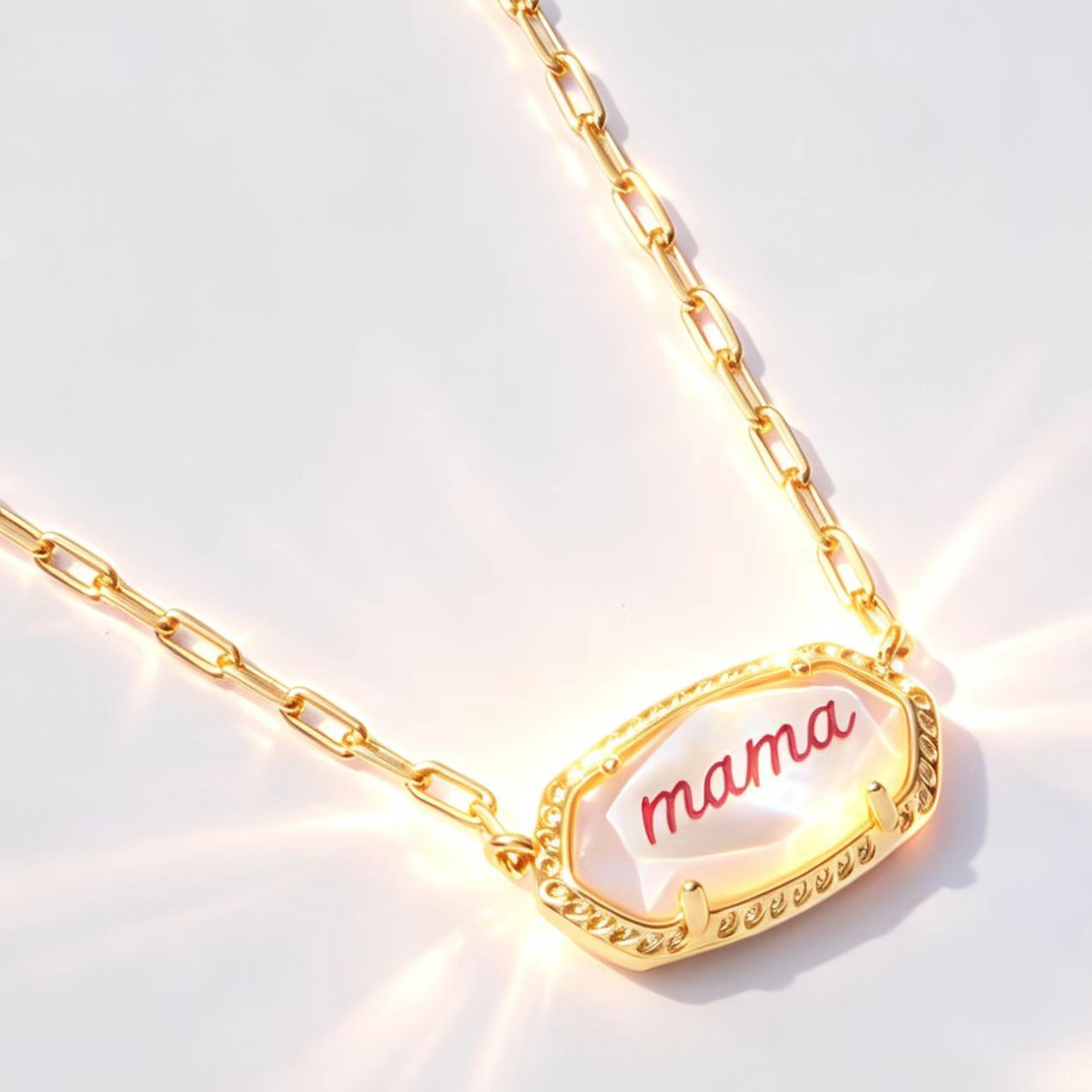 Gold letter “mama” oval pendant necklace with chunky link chain and scalloped border
