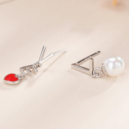 sterling silver pearl and heart stud