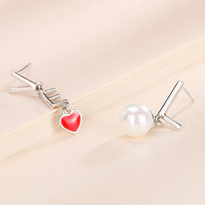 sterling silver pearl and heart stud